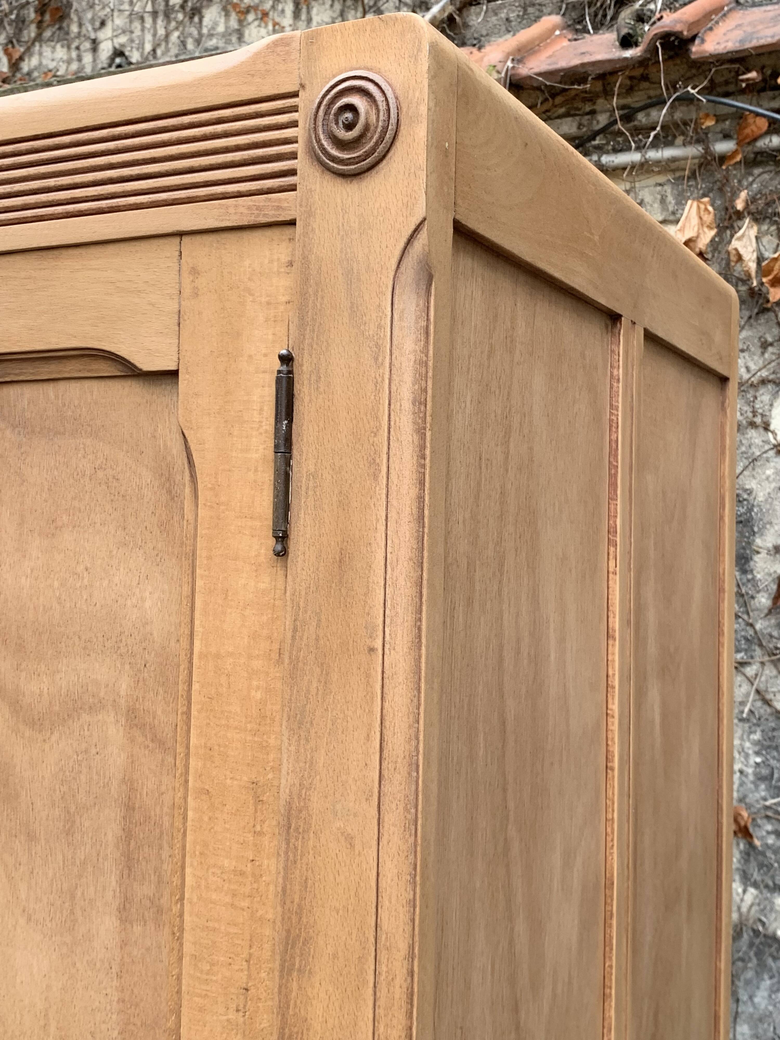 Parisian paneled cabinet in raw wood, 1940