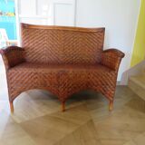 Two-seater banquette in woven rattan, wood and bamboo, 1980s.