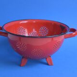 Vintage red enameled sheet metal colander