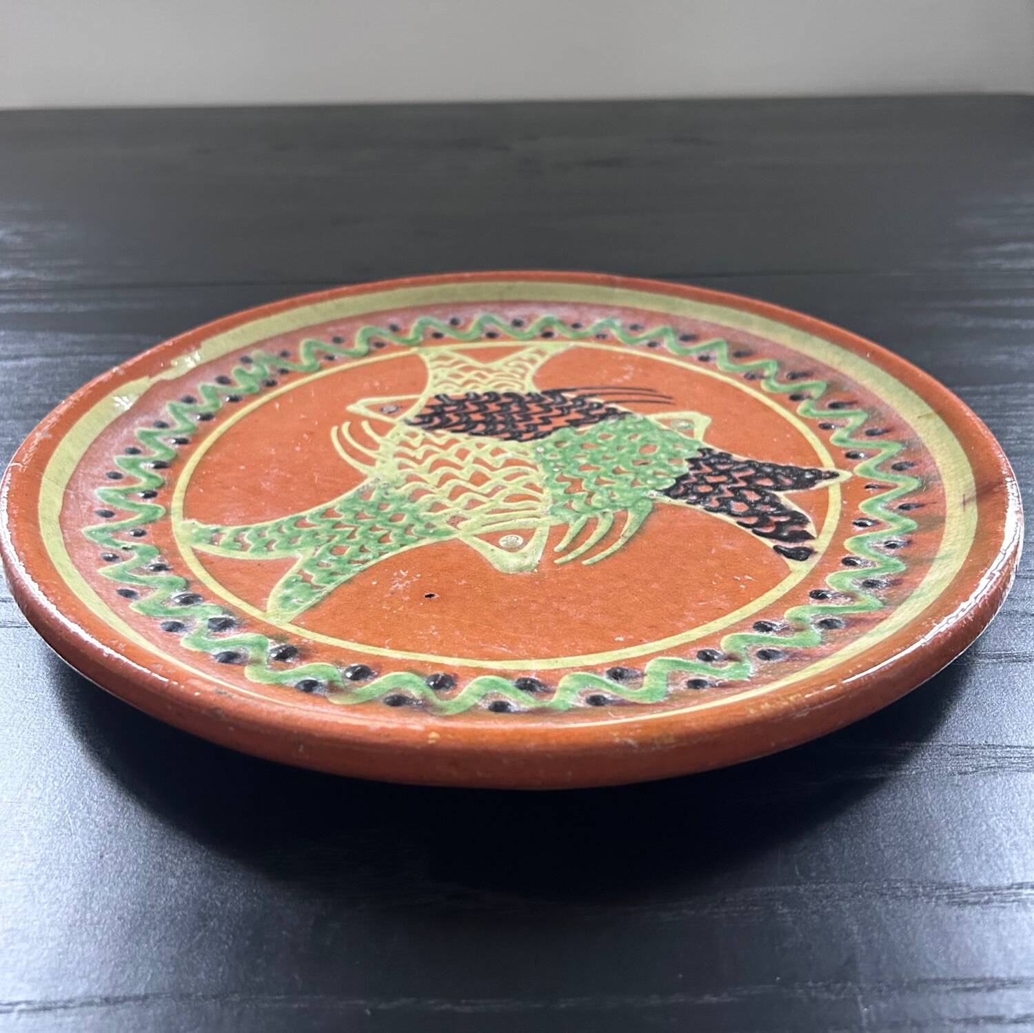 Large handmade dish with fish decoration