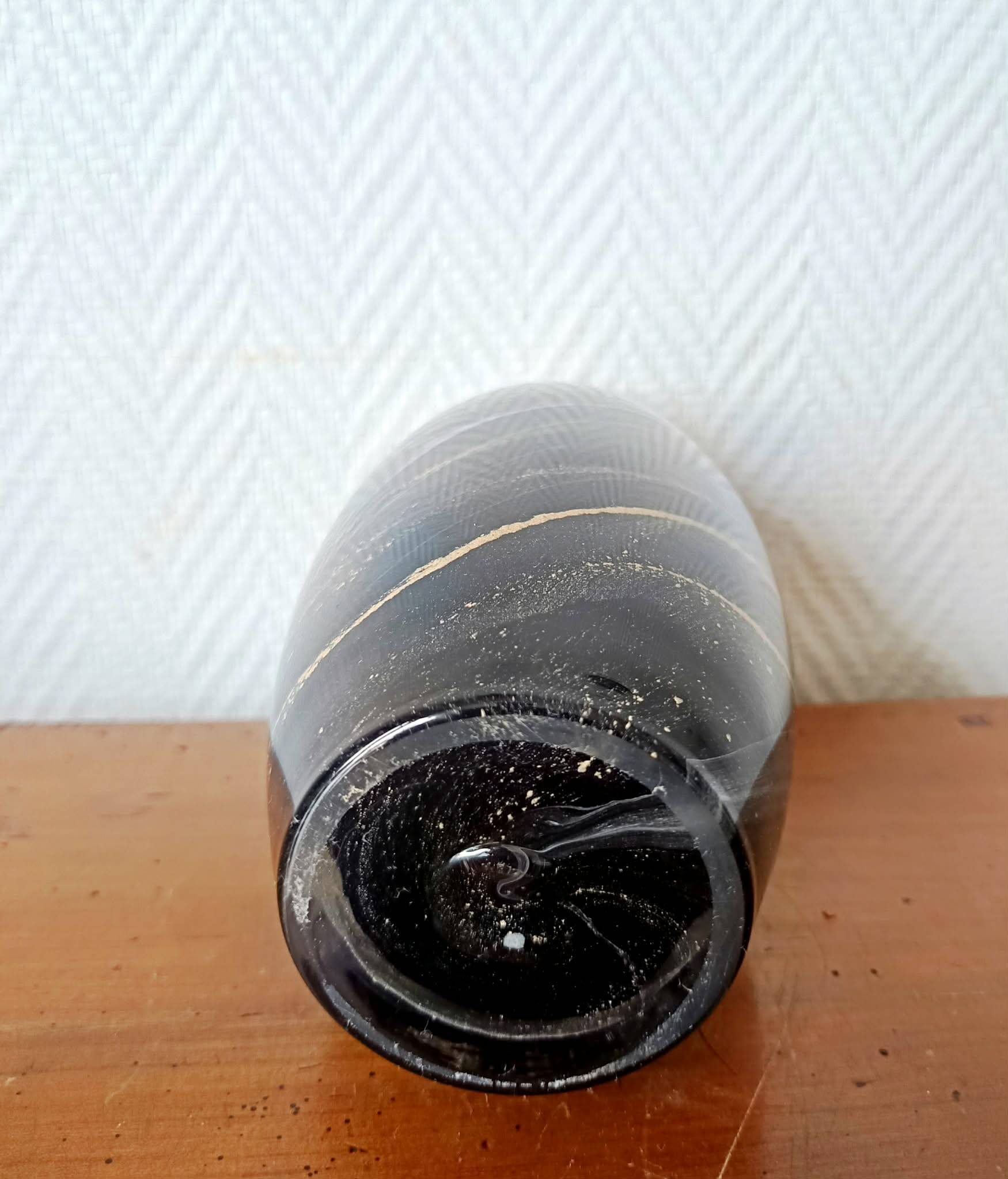 Black and gold glass vase in Murano style