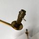 Pair of brass wall lights with articulated arms from the 70s