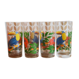 Vintage lemonade glasses with tropical parrot and flower patterns.