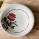 Large antique salad bowl on a pedestal, made of Sarreguemines earthenware.