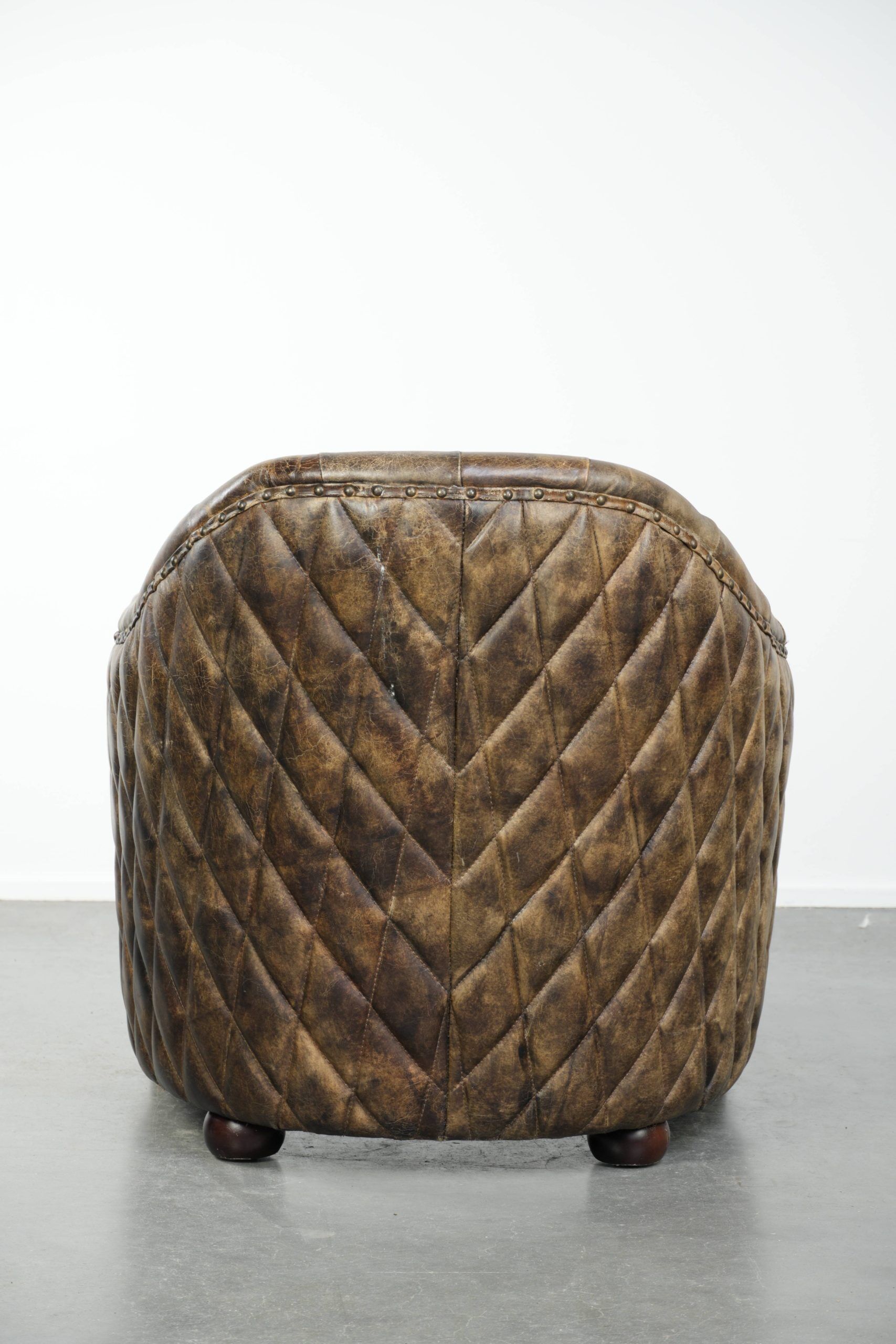 Unique cowhide Chesterfield club armchair with beautiful colour combination