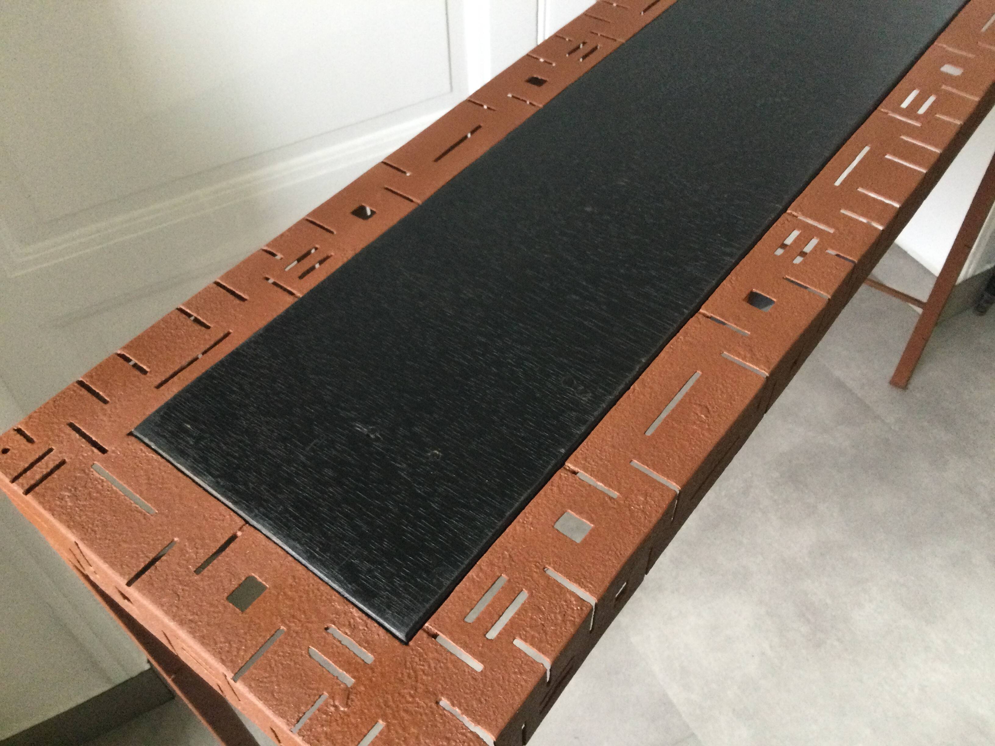 Perforated sheet metal and wood console