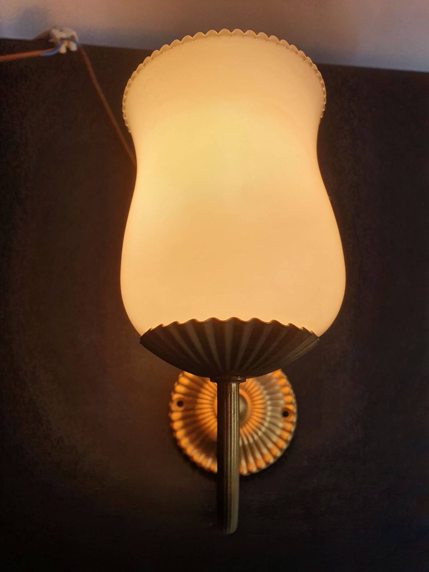 Pair of vintage gold-tone wall sconces with opaline glass globes