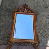 Old large Louis XV style mirror, stucco, wood, resin, beveled