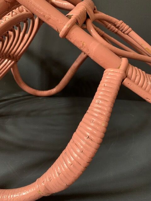 Vintage pink rattan armchair