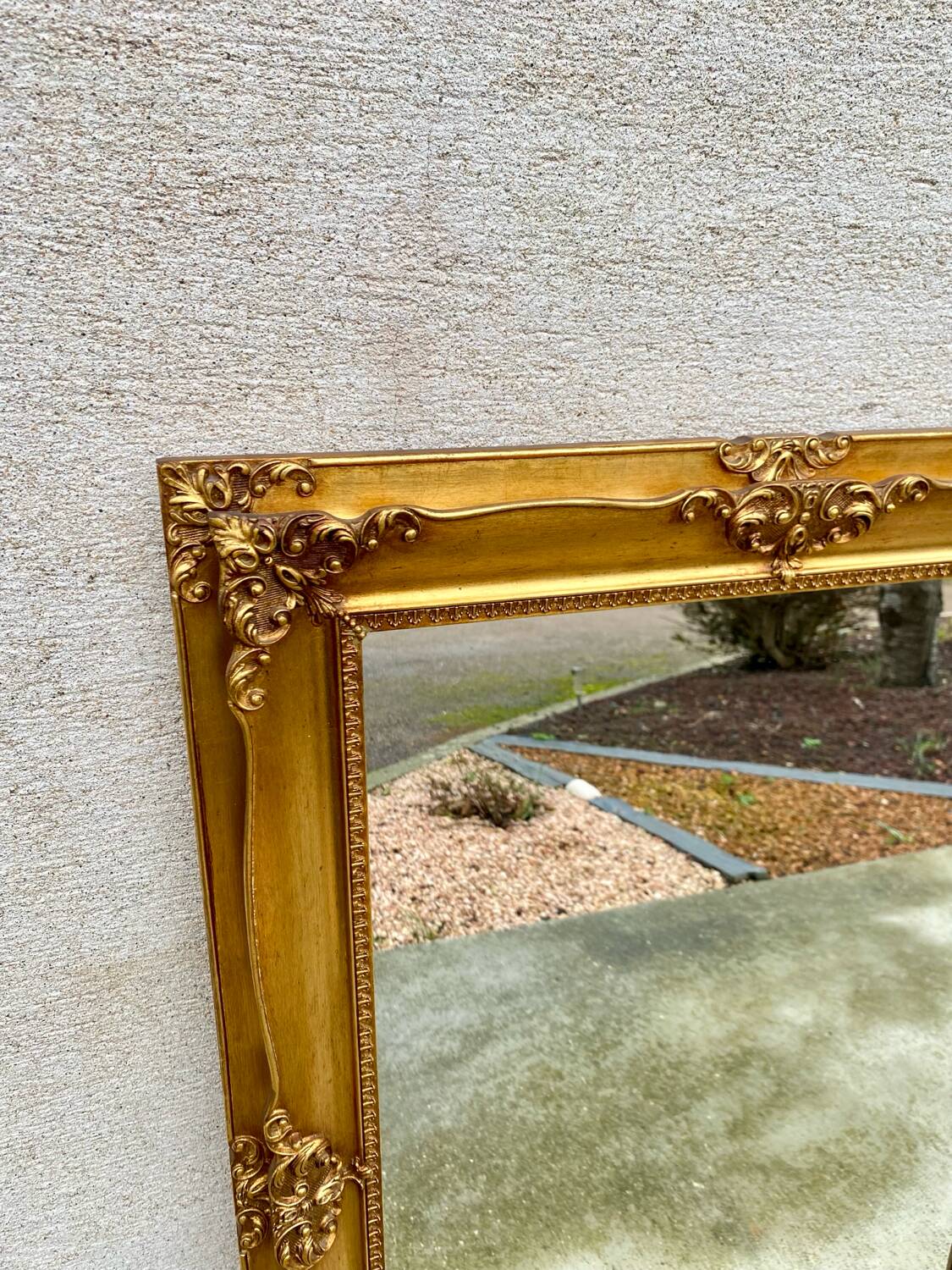 Miroir biseauté en bois doré