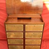 Cardboard maker forming mahogany writing