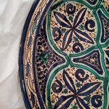 Very large Moroccan dish in enamelled earthenware. Late 19th century, early 20th century.