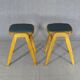 2 Mid-century green vinyl stools with compass legs from the 1960s.