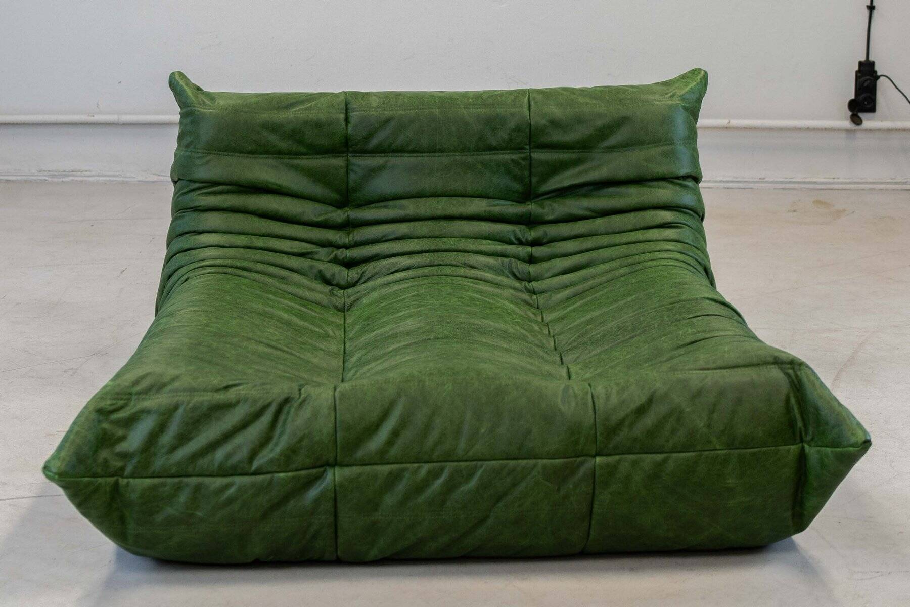Togo chaise lounge in green leather attributed to Michel Ducaroy for Ligne Roset, 1974
