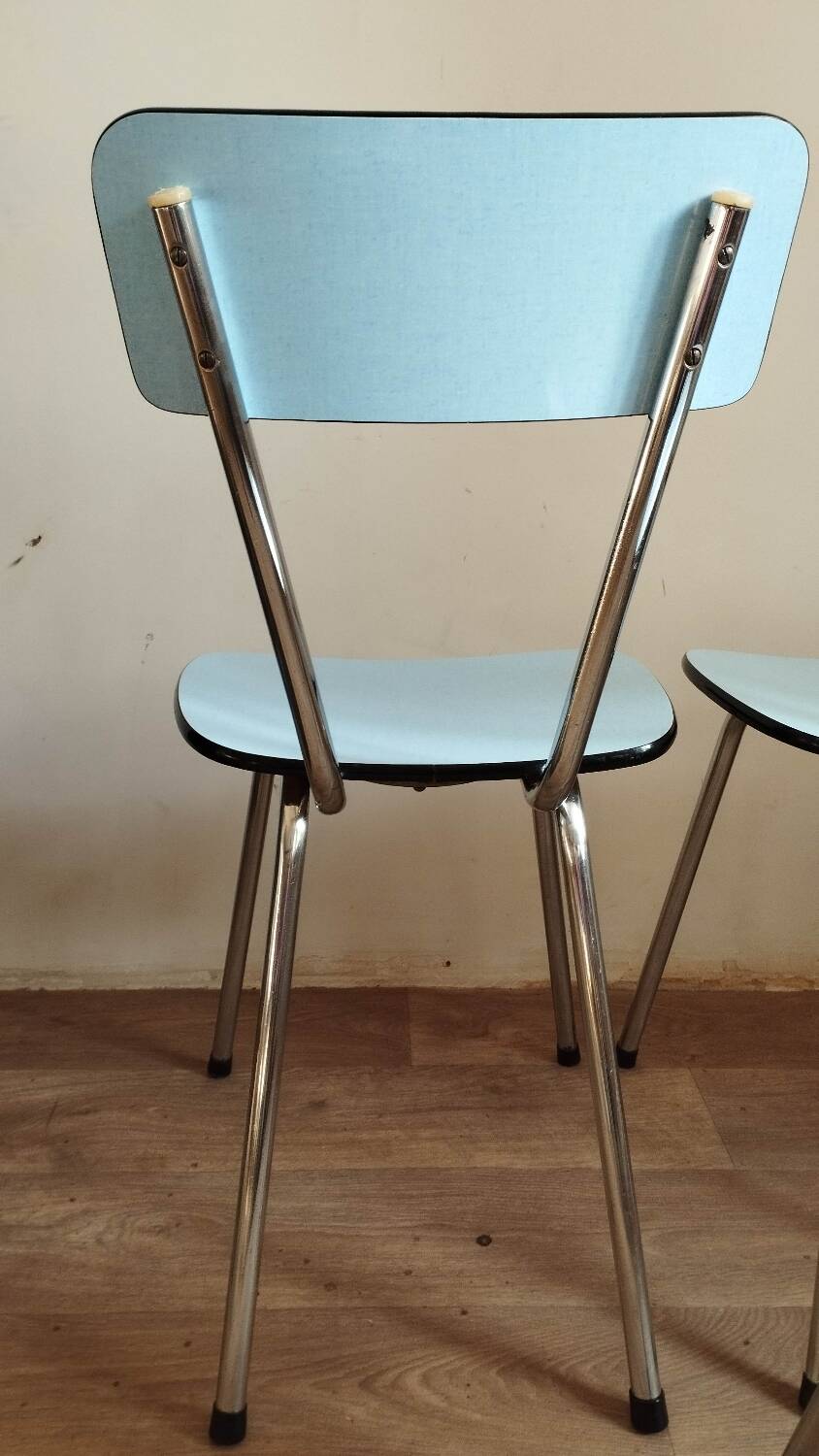 4 blue Formica chairs
