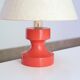 Red wooden lamp with herbarium-style lampshade from the 70s