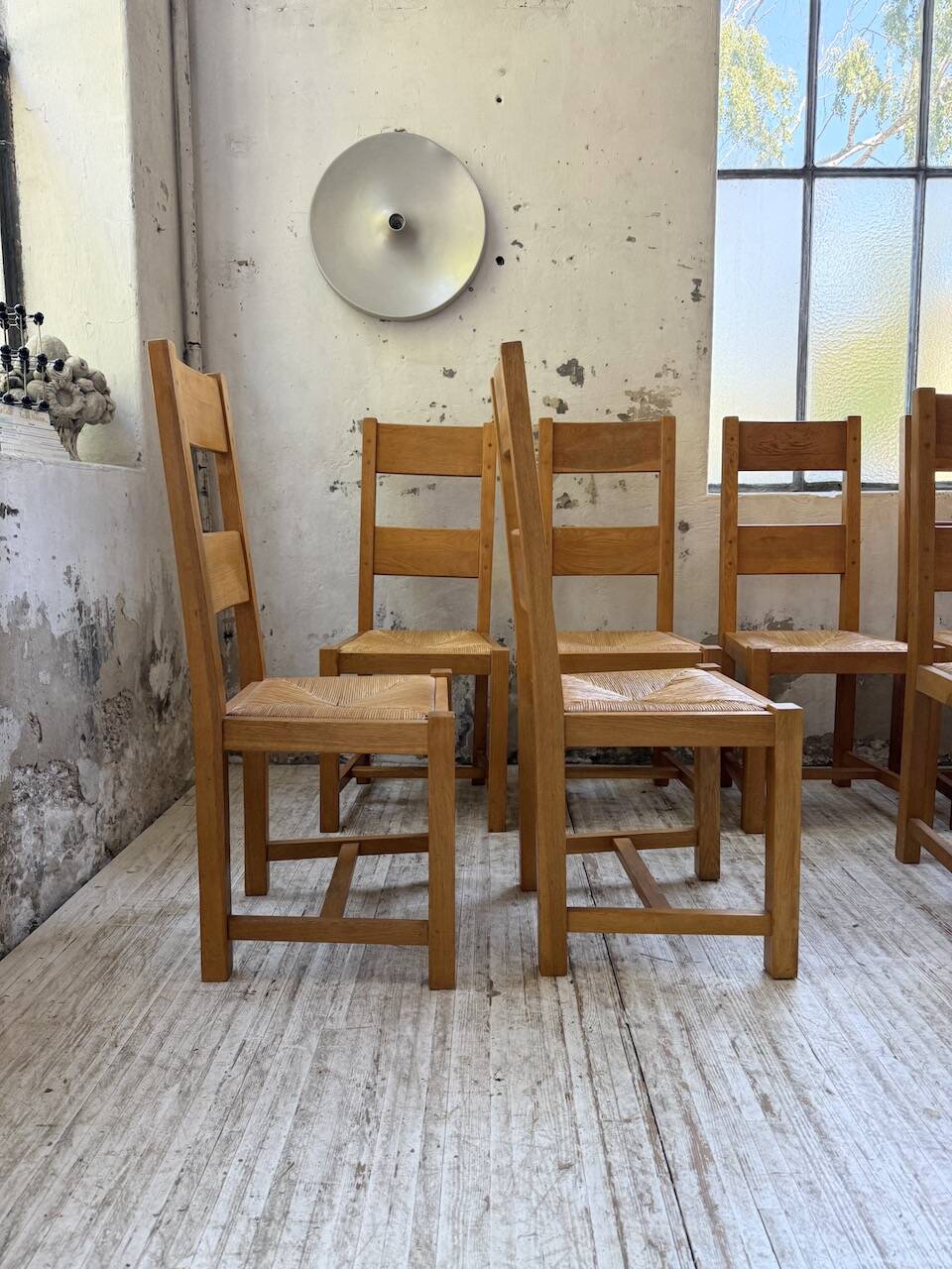 Set of 8 blond oak chairs with straw seats