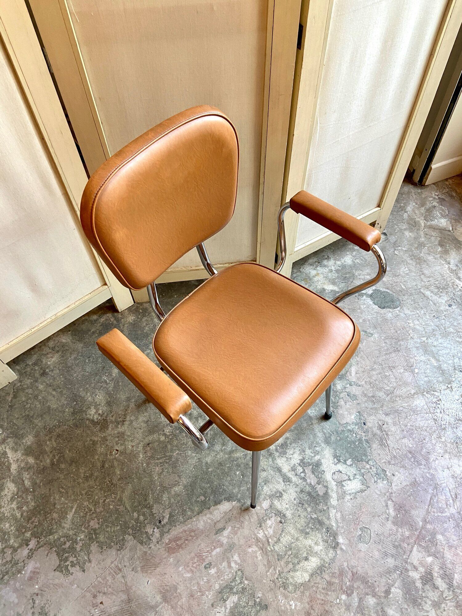 Armchair in chromed metal and tawny skaï 1950s