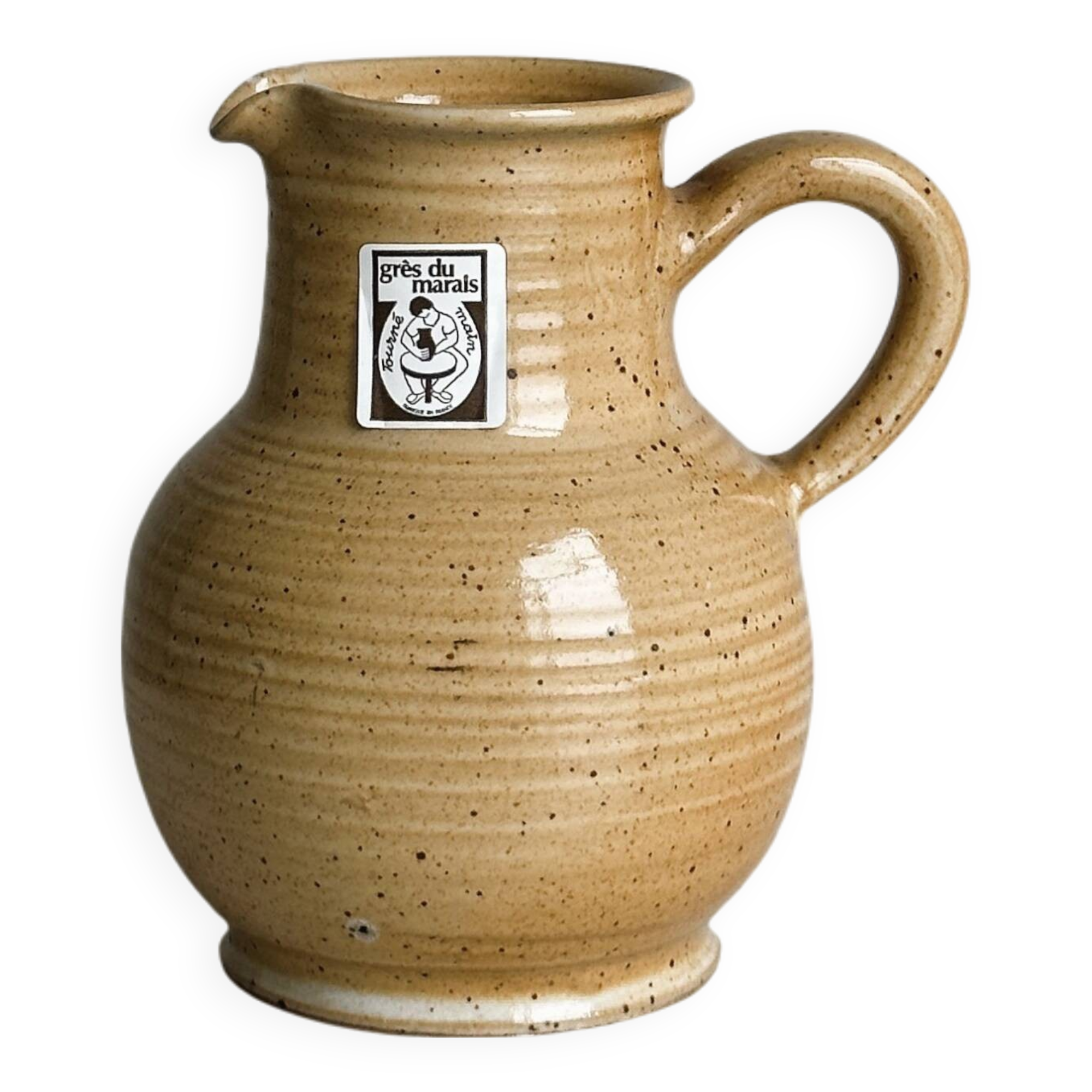 Hand-thrown ceramic pitcher
