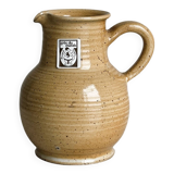 Hand-thrown ceramic pitcher