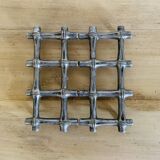 Silver metal table mat imitating bamboo