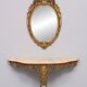 Classic gilded brass console with oval mirror from the 1950s, Italy.