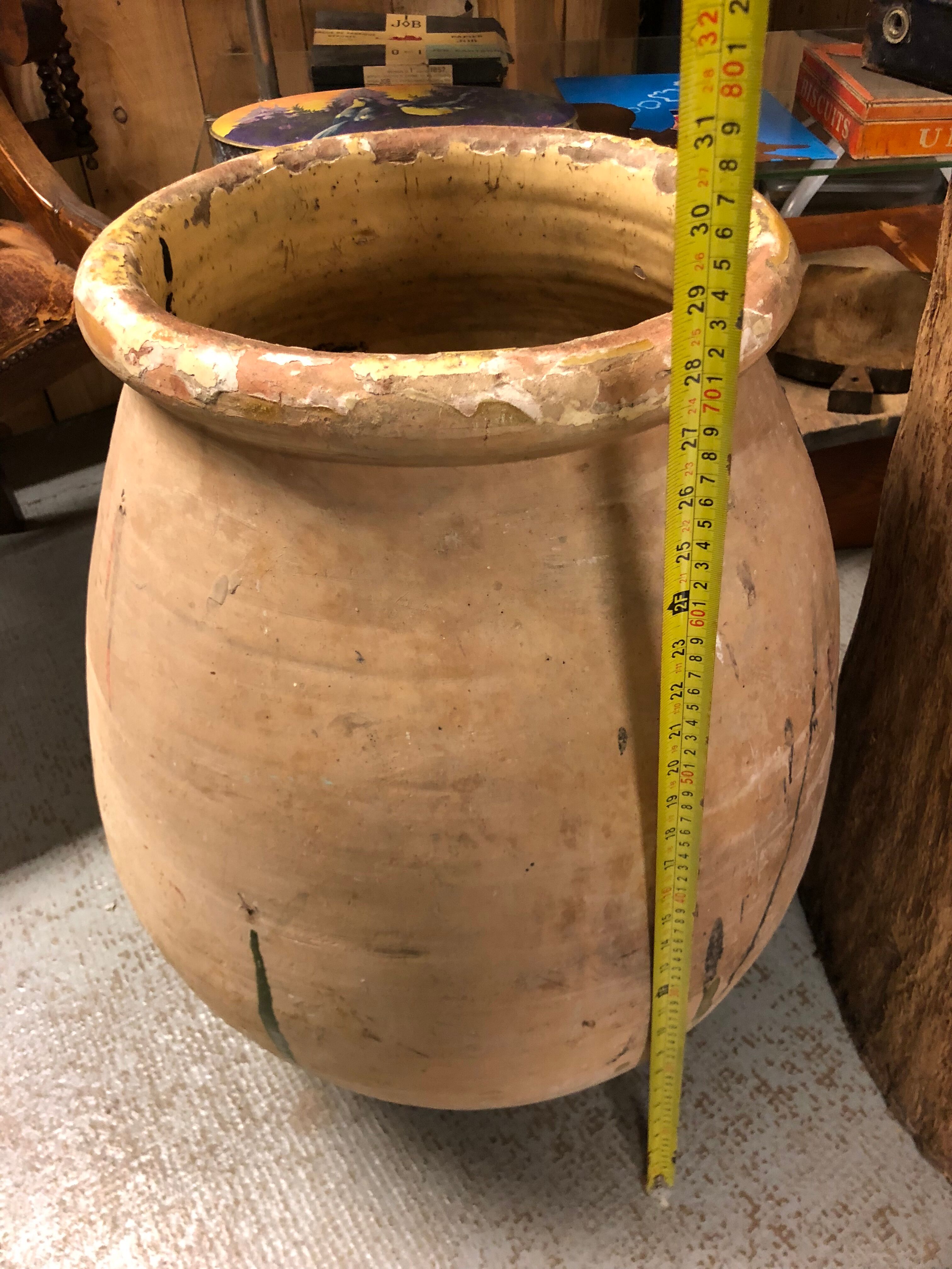 Yellow glazed terracotta garden jar