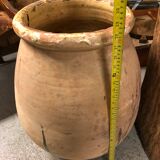 Yellow glazed terracotta garden jar