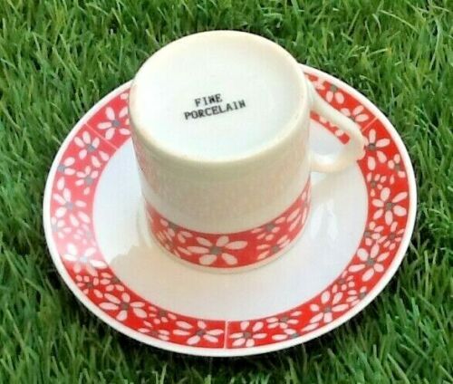 Suite of 6 coffee cups and milk pot, porcelain fine white with floral curly