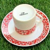 Suite of 6 coffee cups and milk pot, porcelain fine white with floral curly