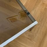 Glass and metal coffee table in the 70s