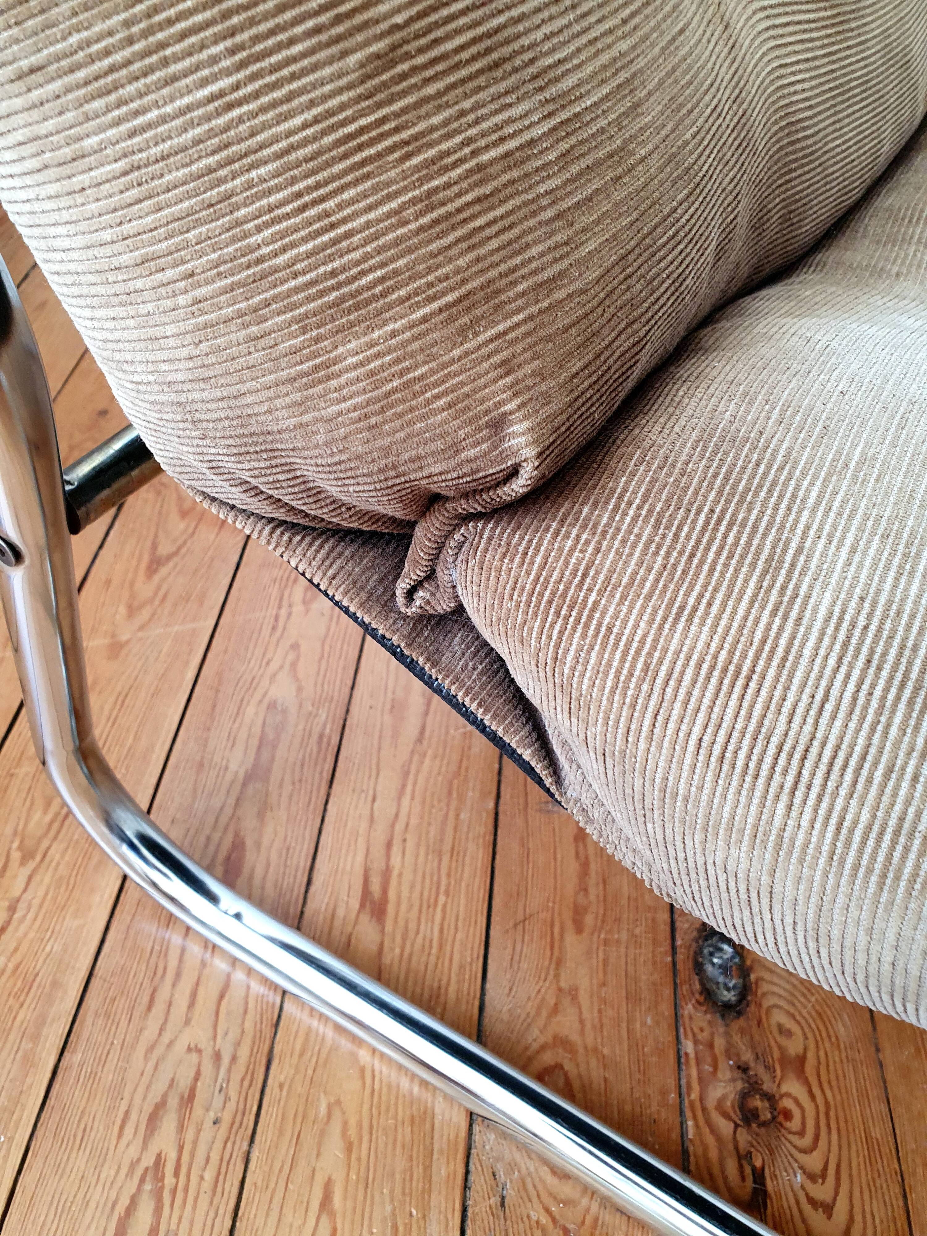 Vintage tubular chrome and velvet armchair