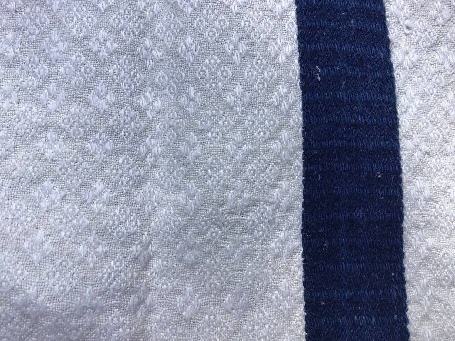 Old ecru Basque linen tea towel with navy blue stripes