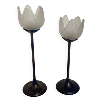 Pair of glass and metal flower candlesticks