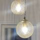 Triple pendant light with vintage glass globes
