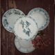 Lot of four mismatched hollow plates