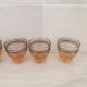 Pink and blue liqueur service and its small glasses