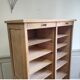 Antique furniture with double curtains sanded to white