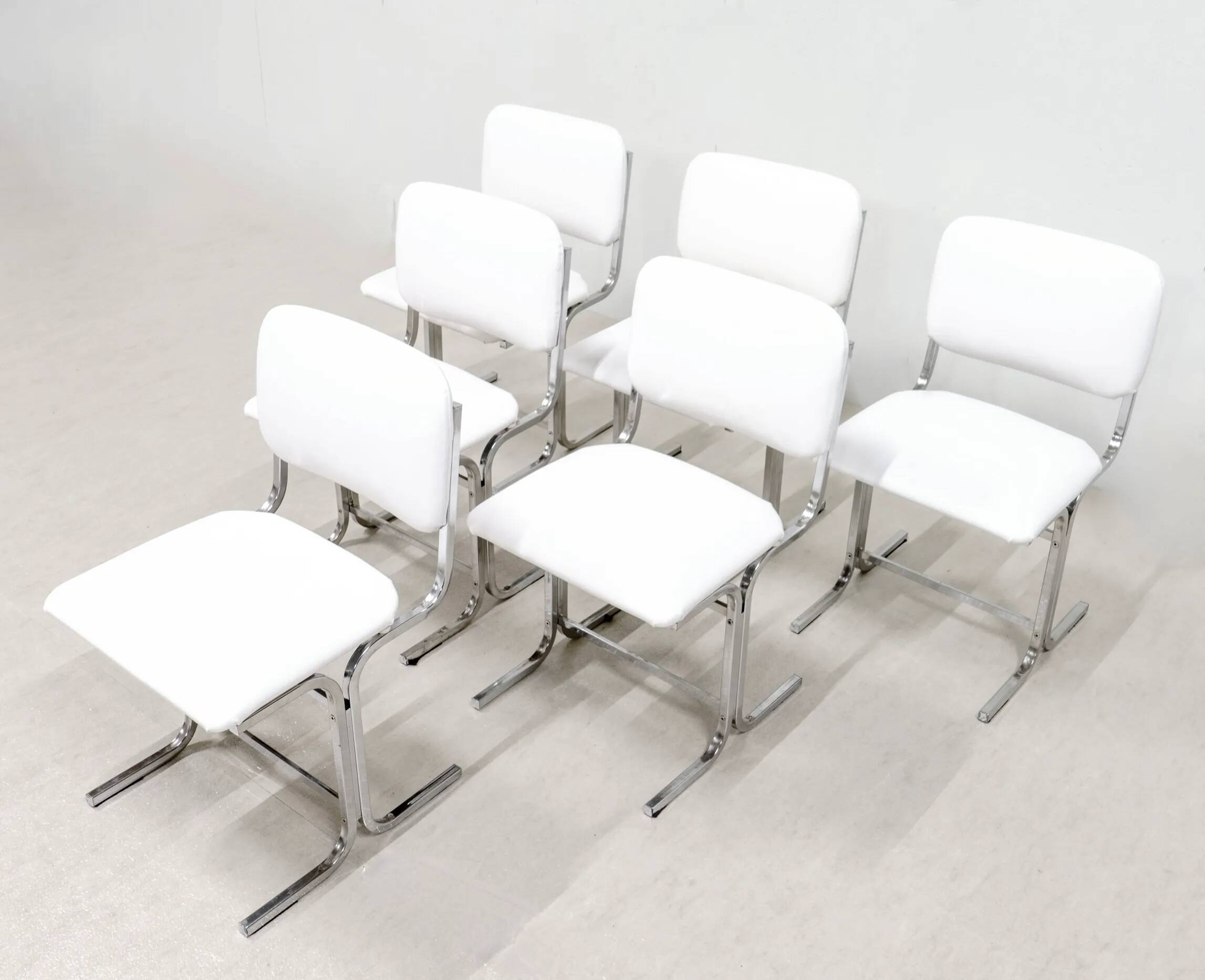 Six chairs. Italy 1970s.