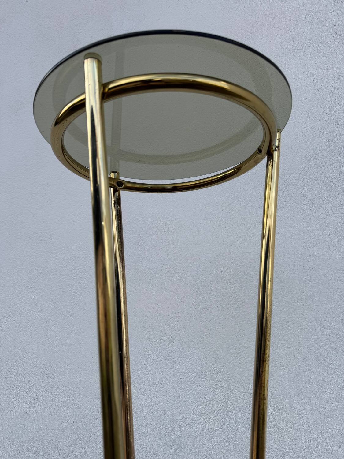 Golden tripod stand with smoked glass from the 1970s.