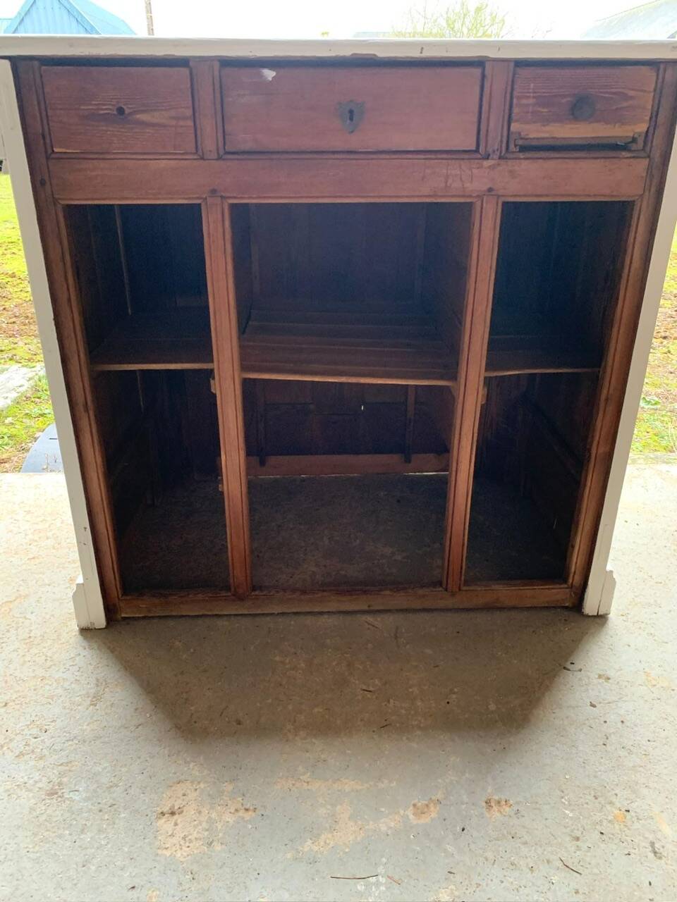 White counter with brass coin mechanism
