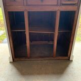 White counter with brass coin mechanism