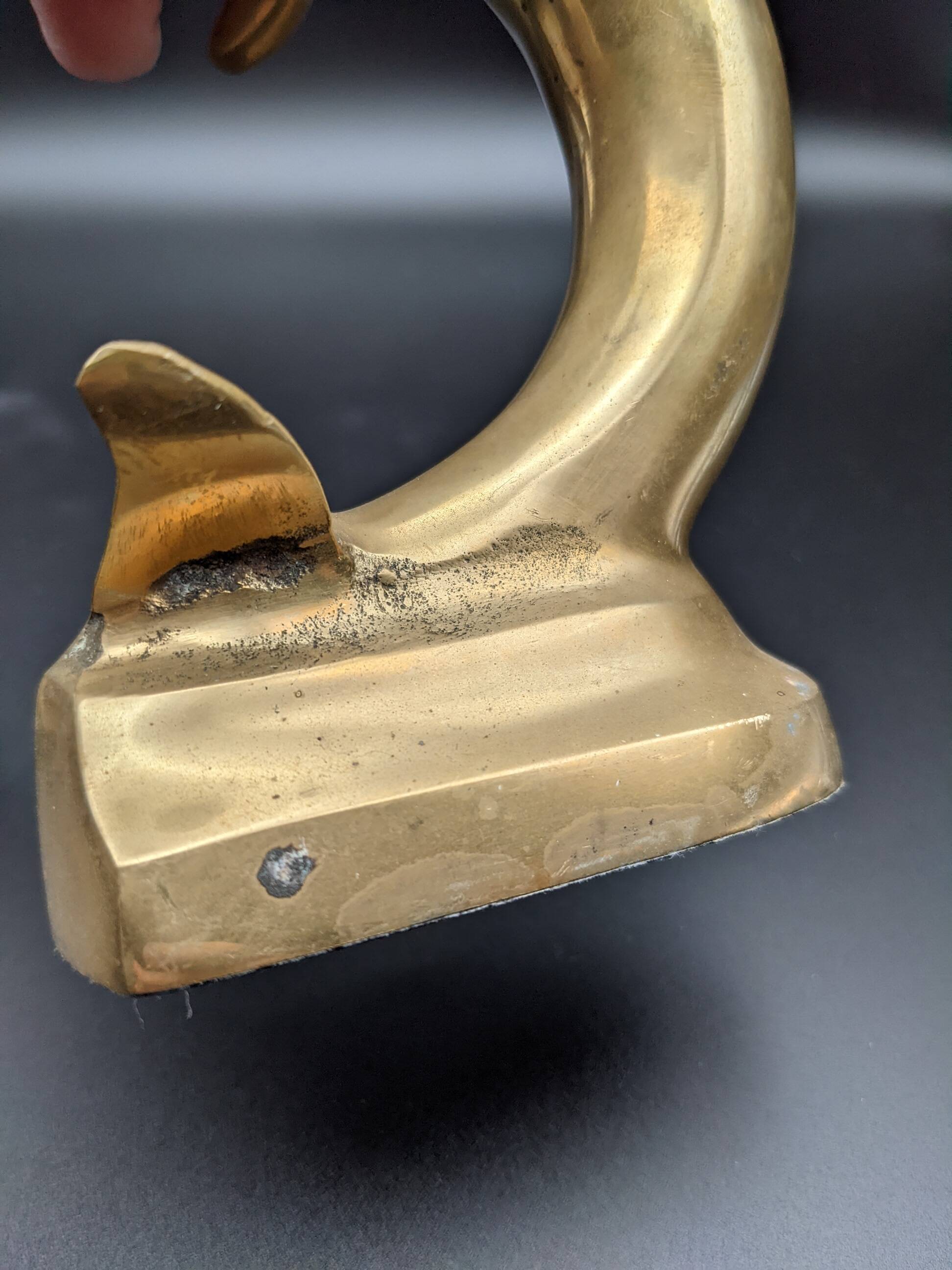 Pair of brass dolphins bookends