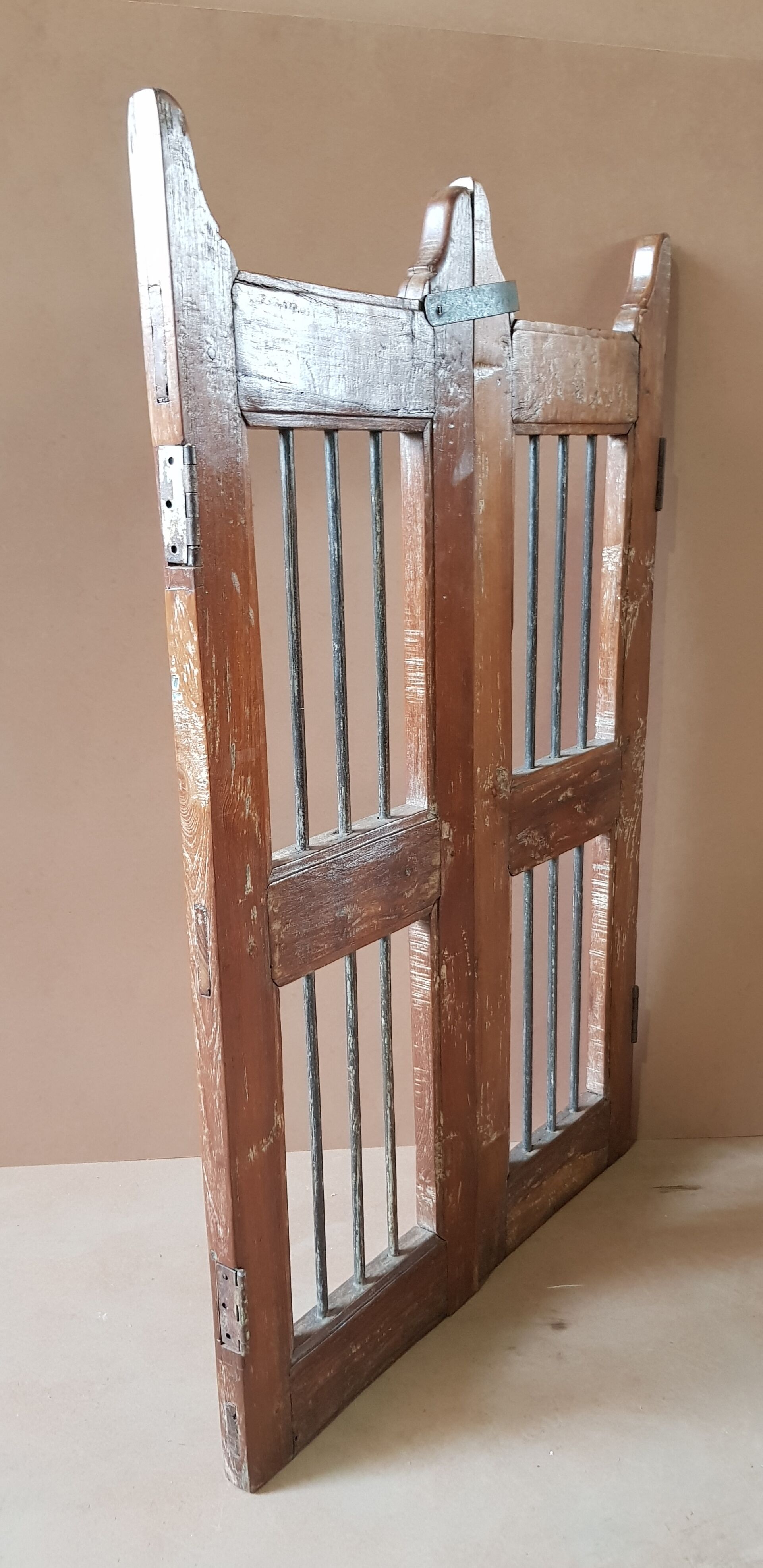 Old Burmese teak gate with openwork wrought iron panels