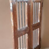 Old Burmese teak gate with openwork wrought iron panels