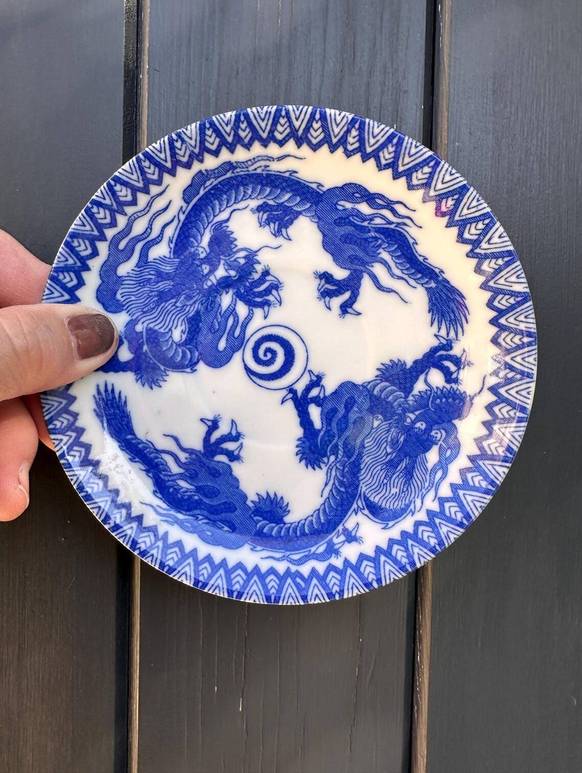 Small vintage plates made in Japan in blue and white porcelain.
