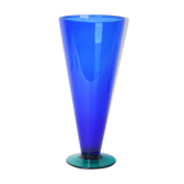 Blue glass vase with green foot