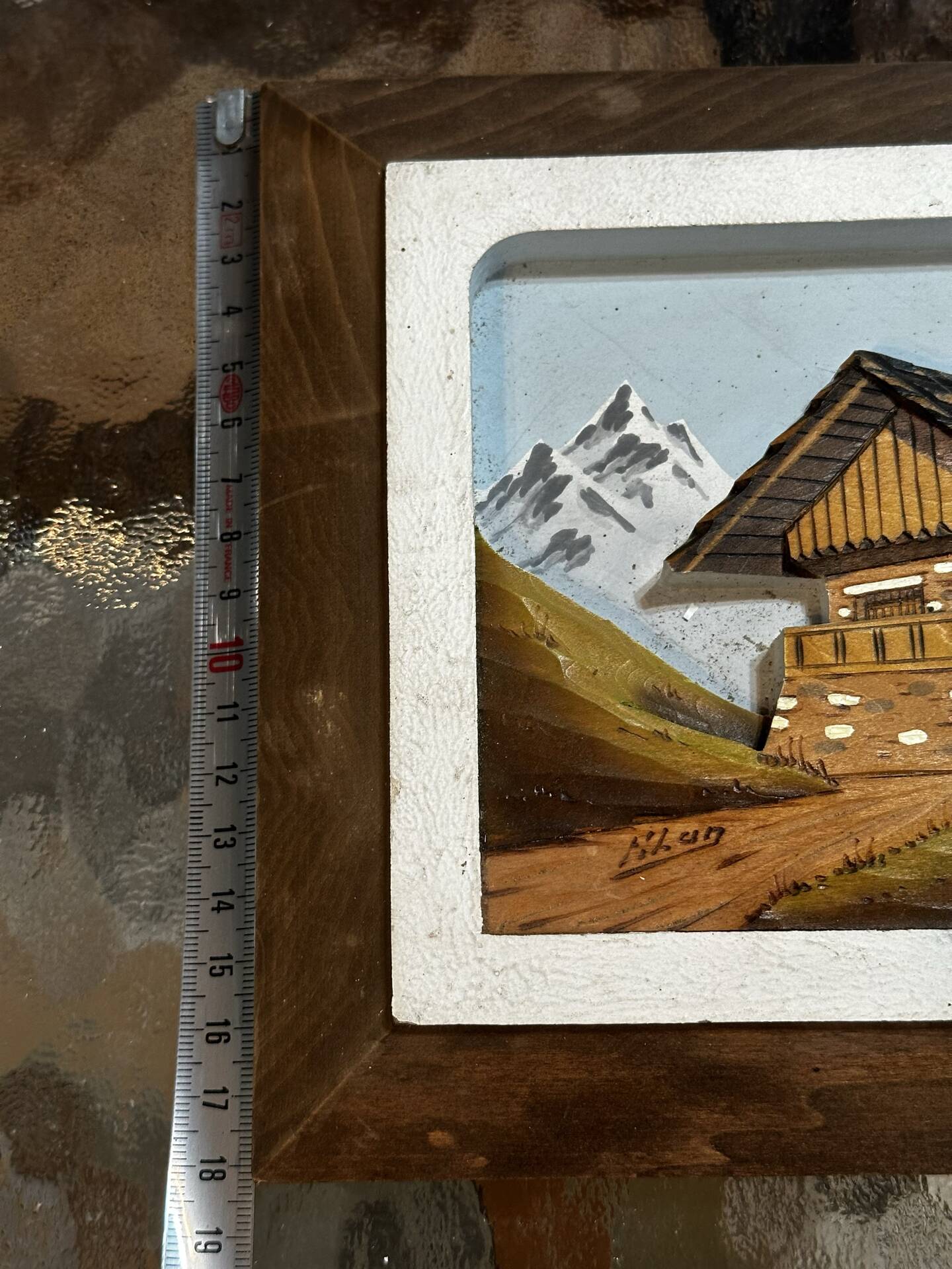 Carved and painted wooden Alpine panel signed 18 / 26 cm
