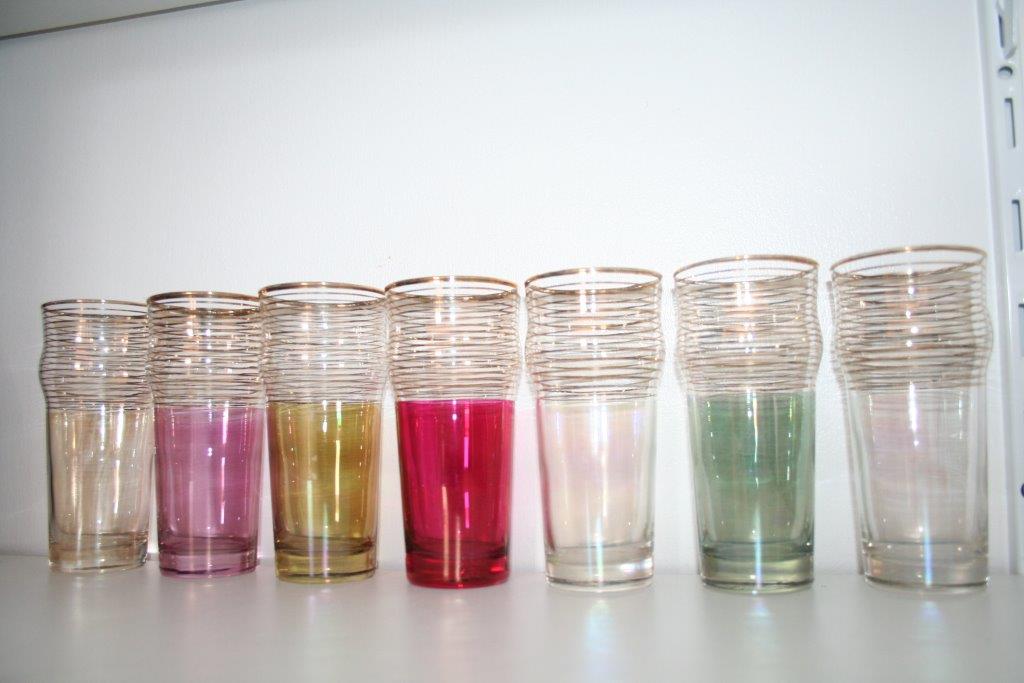 Service has lemonade pitcher and 7 glasses glass