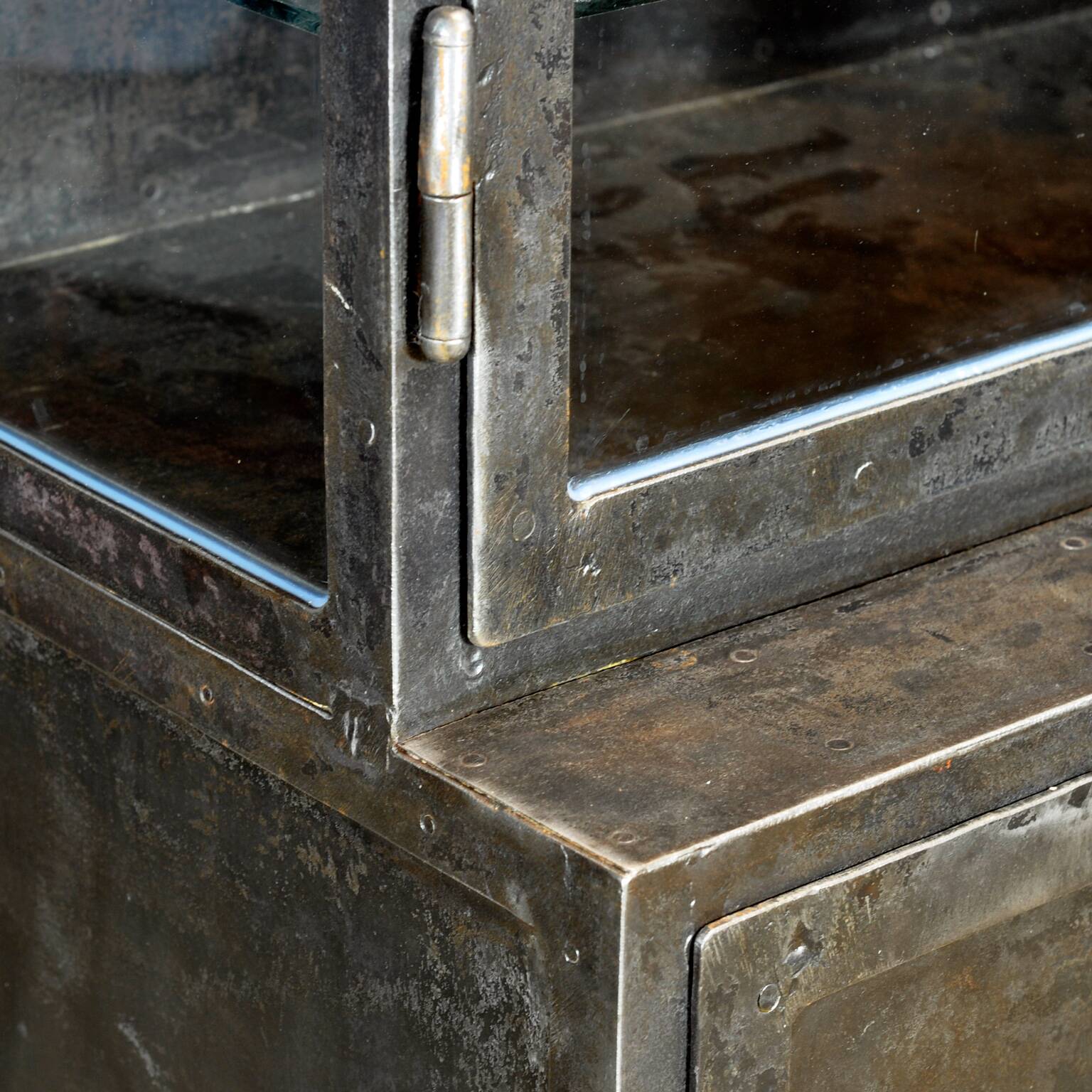 Polished iron medicine cabinet, 1930s